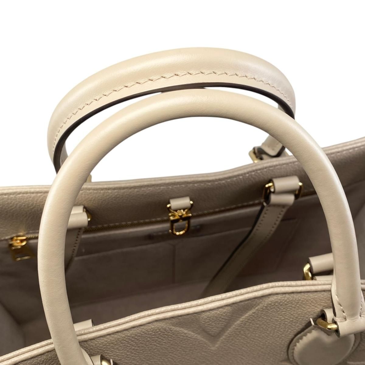 Louis Vuitton Tote On The Go Monogram Empreinte Tourtle le Beige — view 9