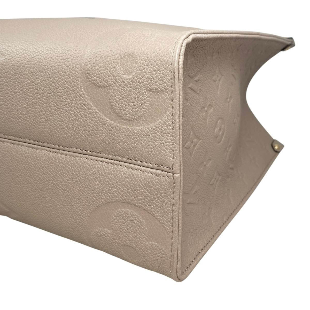 Louis Vuitton Tote On The Go Monogram Empreinte Tourtle le Beige — view 7