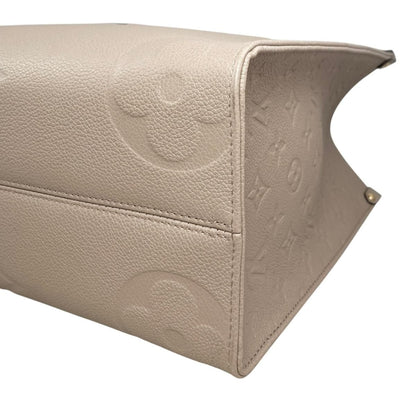 Louis Vuitton Tote On The Go Monogram Empreinte Tourtle le Beige — view 7
