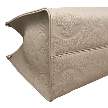 Louis Vuitton Tote On The Go Monogram Empreinte Tourtle le Beige — view 6