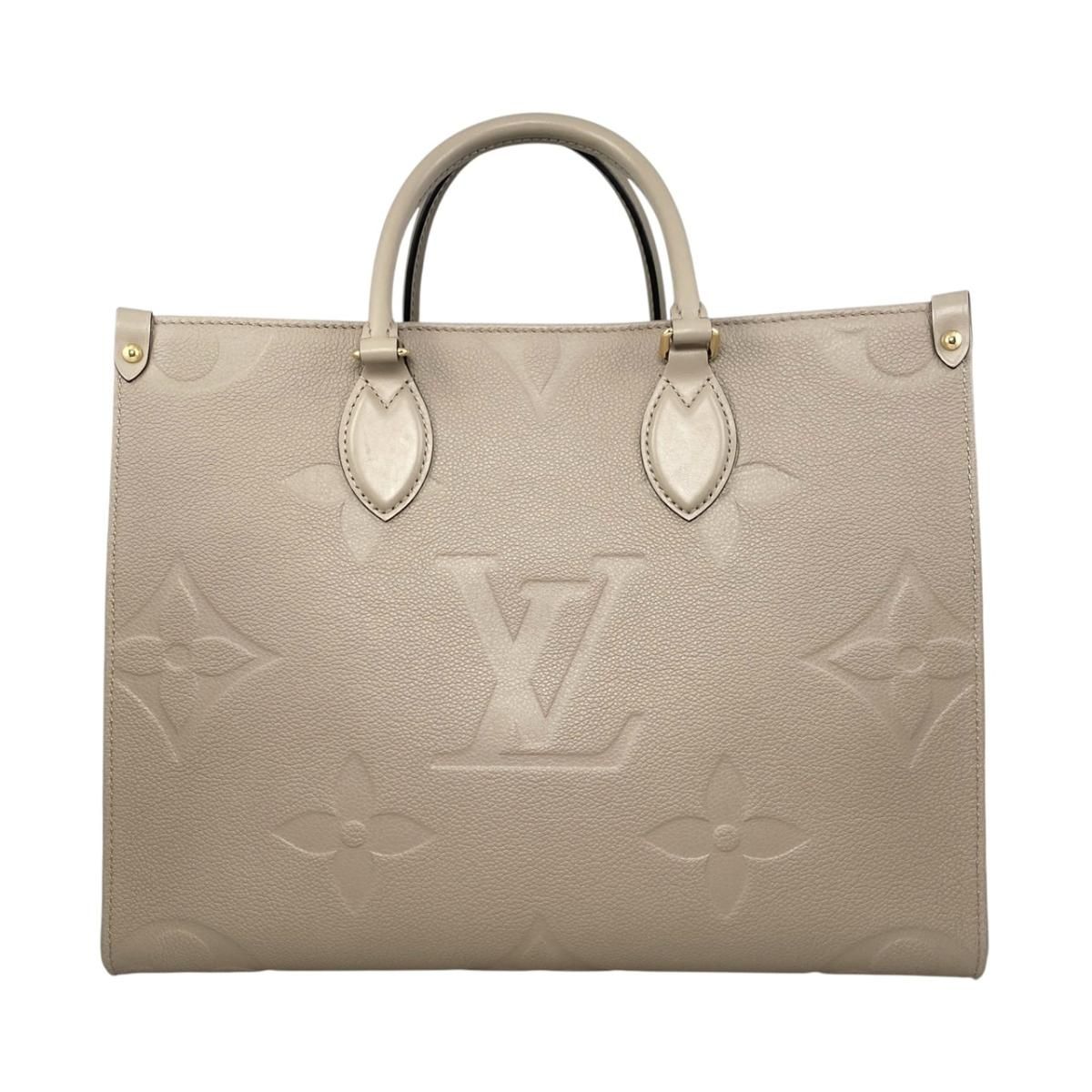 Louis Vuitton Tote On The Go Monogram Empreinte Tourtle le Beige