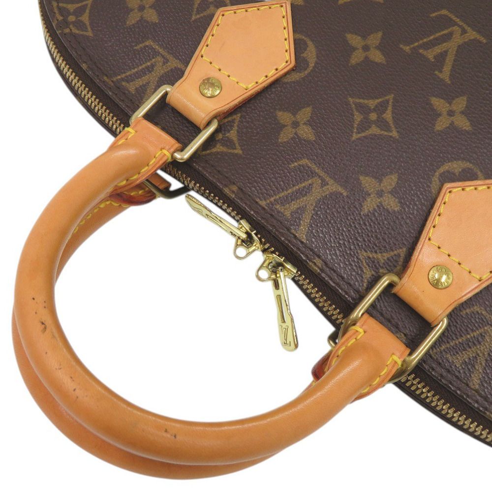 Louis Vuitton Alma Monogram Handbag — view 7