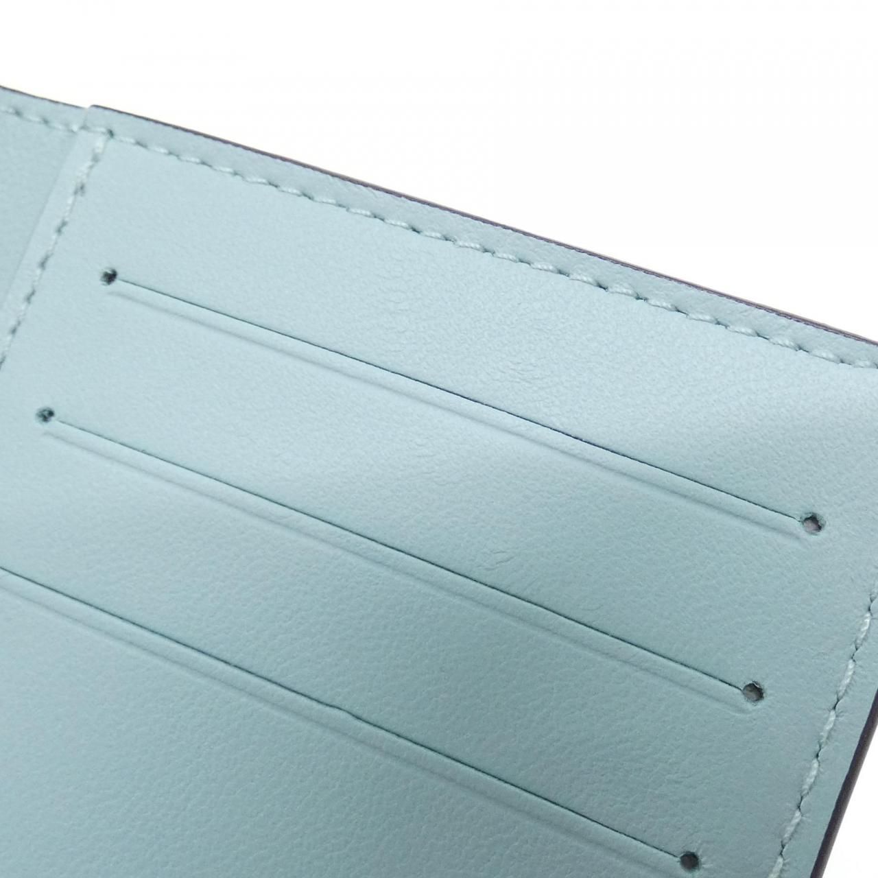 Louis Vuitton Taurillon LV Vertical Wallet Compact — view 7