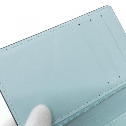 Louis Vuitton Taurillon LV Vertical Wallet Compact — view 6