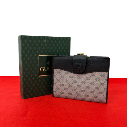 Gucci Vintage Micro GG Logo Leather Kiss Lock Bifold Wallet Navy