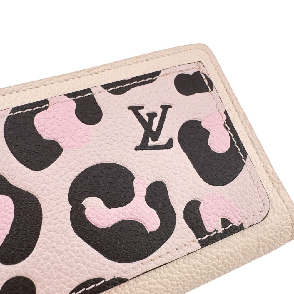 Louis Vuitton Portefeuille Clair Empreinte Leather Trifold Wallet White — view 7