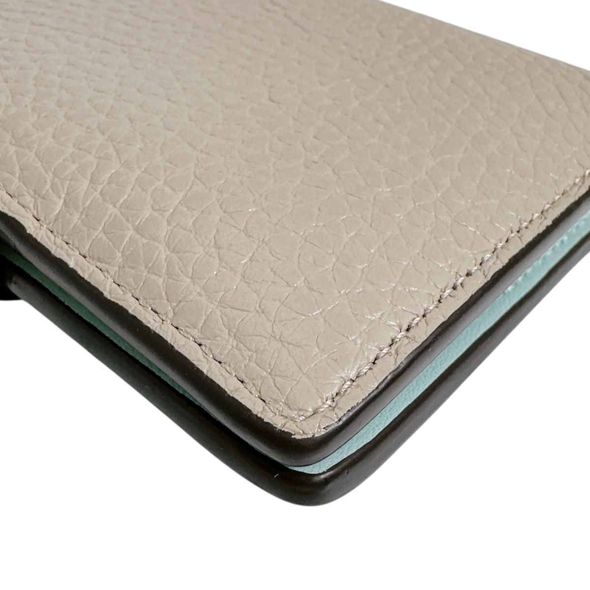 Louis Vuitton Taurillon Leather Bifold Wallet Vertical Compact Beige — view 8