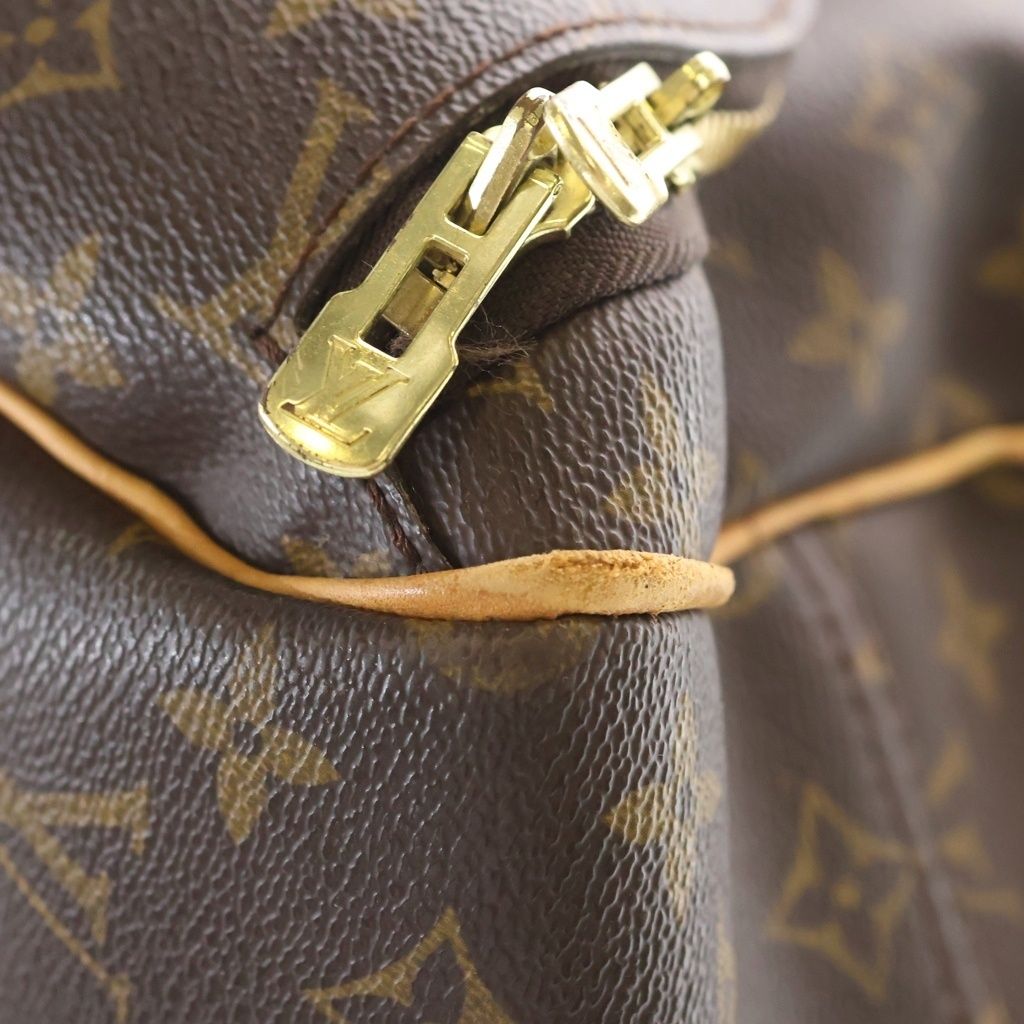 Louis Vuitton Evasion Bag Monogram Handbag Brown — view 7