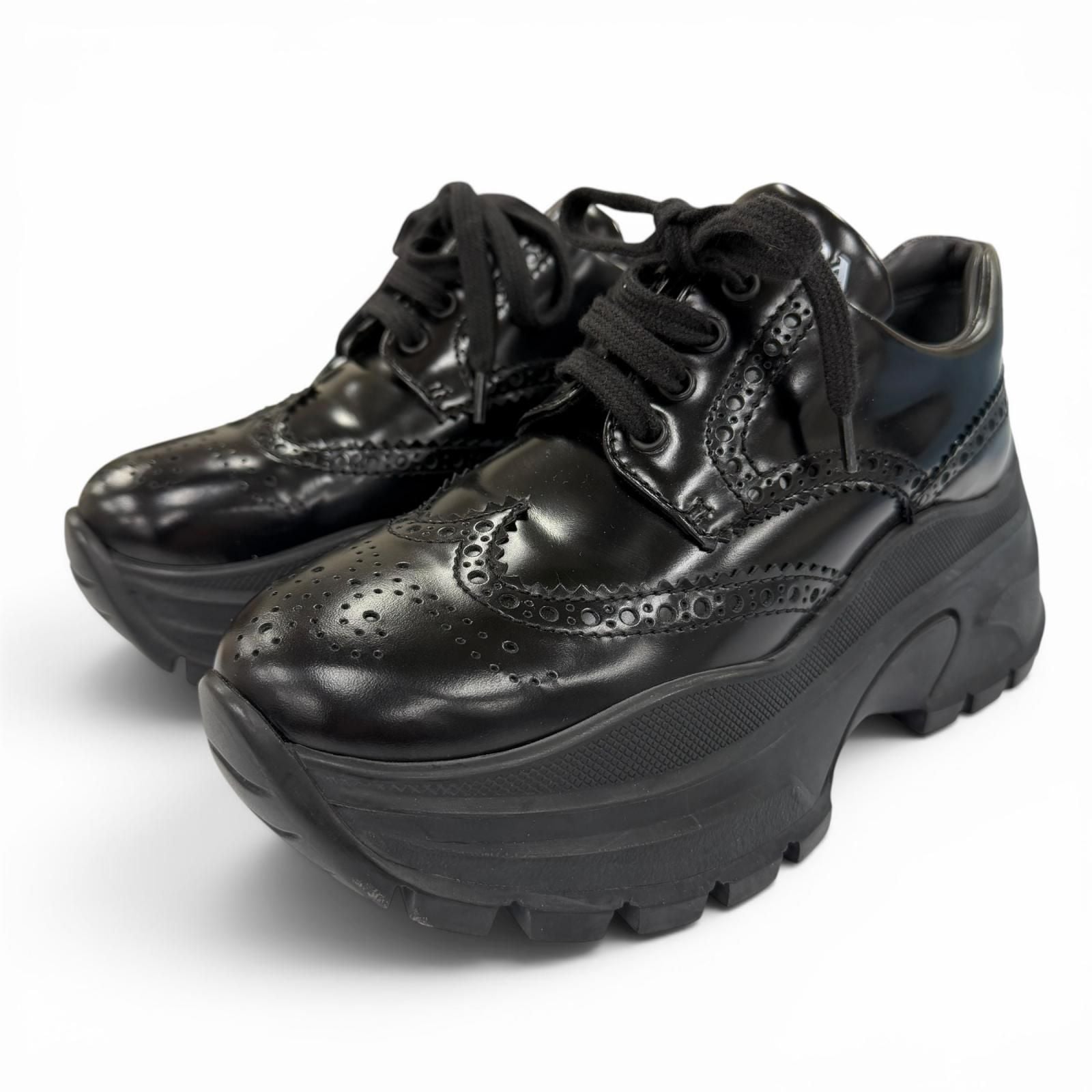 Prada Wingtip Medallion Lace Up Leather Sneakers Black
