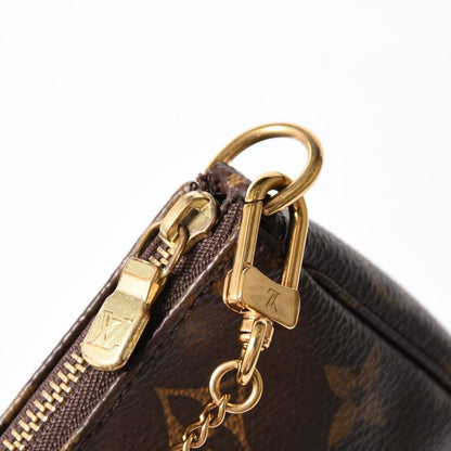 Louis Vuitton Monogram Mini Pochette Accessoires Pouch Brown — view 6