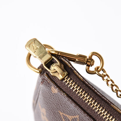 Louis Vuitton Monogram Mini Pochette Accessoires Pouch Brown — view 7
