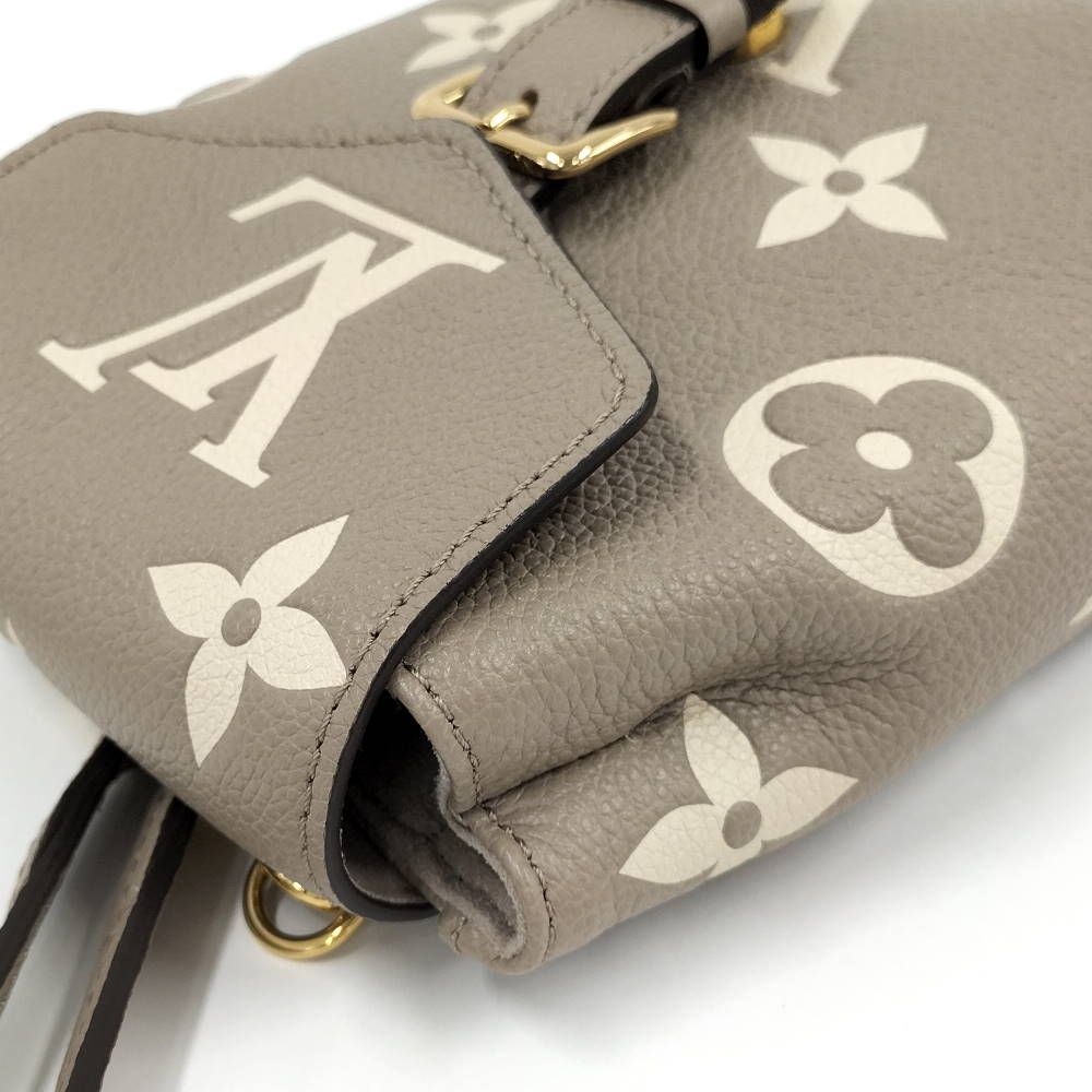 Louis Vuitton Tiny Backpack Monogram Empreinte Beige — view 6