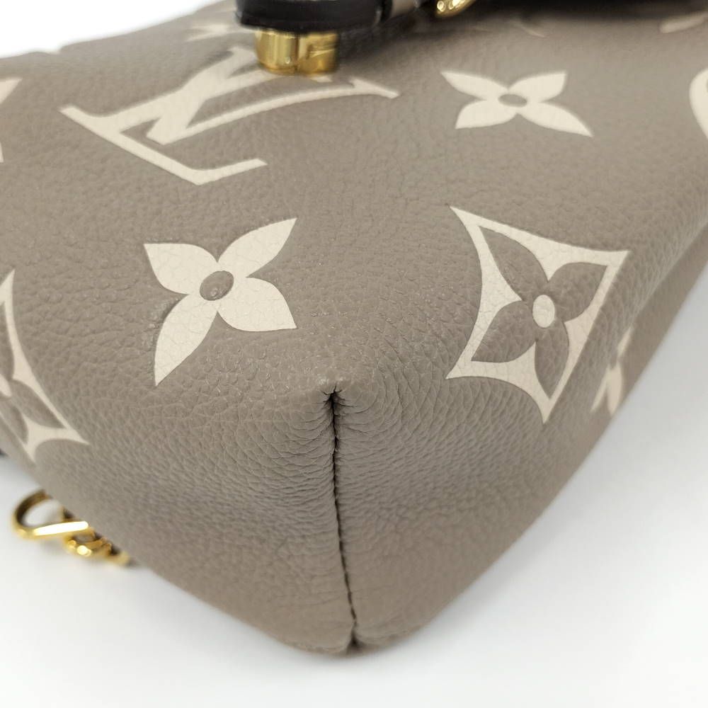 Louis Vuitton Tiny Backpack Monogram Empreinte Beige — view 3