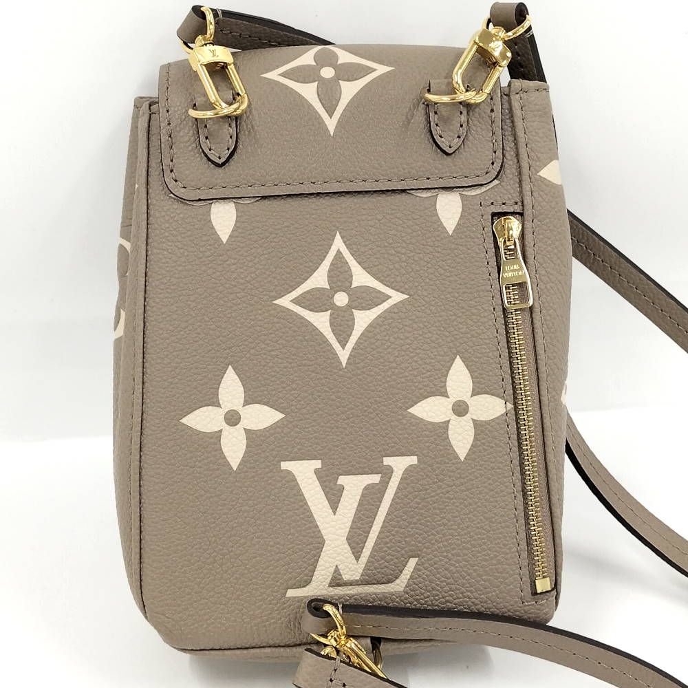 Louis Vuitton Tiny Backpack Monogram Empreinte Beige — view 2