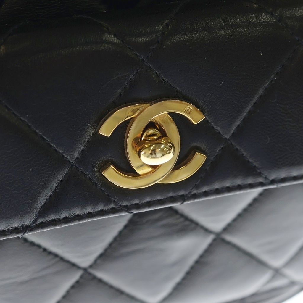 Chanel Quilted Backpack Lambskin Gold Black Seal — view 6