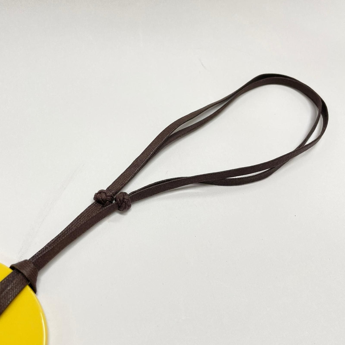 Hermes Pendant Buffalo Horn Lacquer Ismu Brown Yellow — view 3