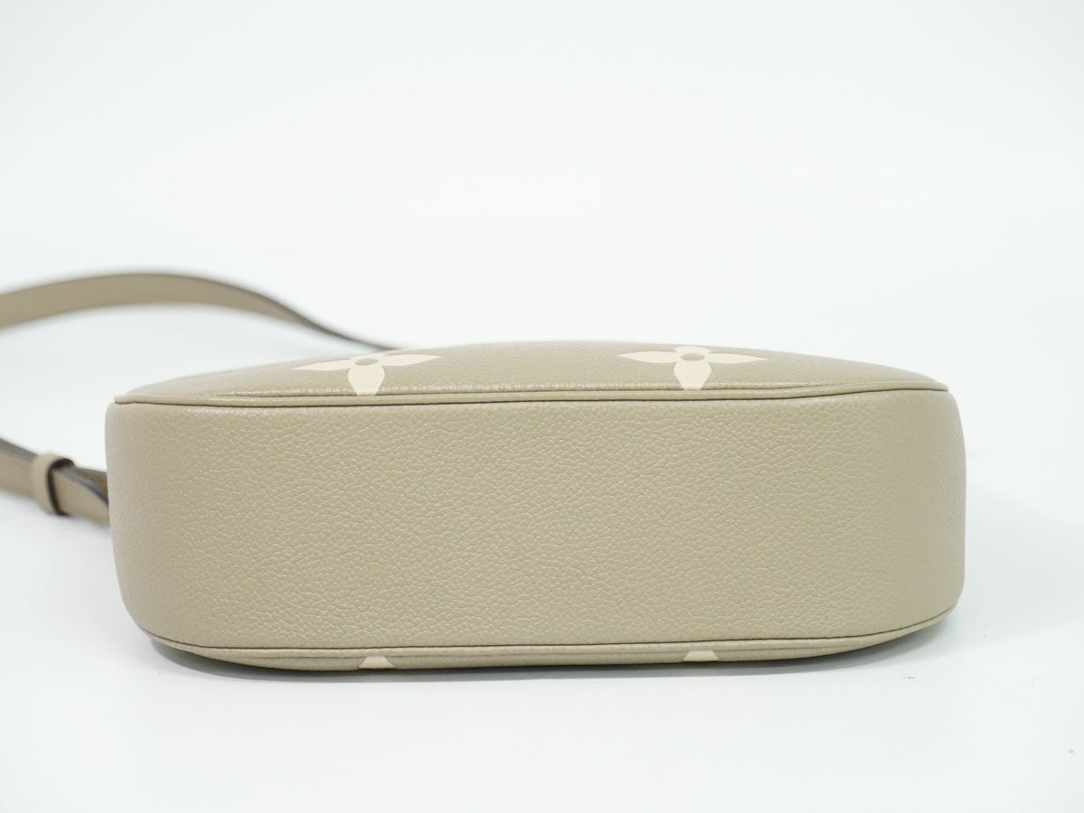 Louis Vuitton LV Bagatelle NM Bicolor Monogram Empreinte Leather 2-Way — view 3