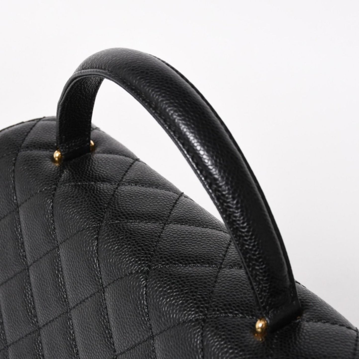 Chanel Quilted CC Logo CC Handbag Top Handle Turnlock Caviar Leather Black Gold — view 4