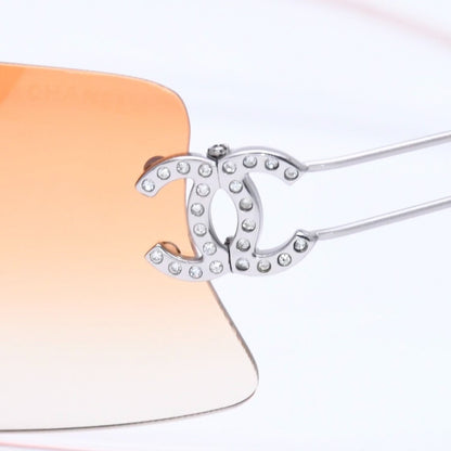 Chanel Rimless Sunglasses Orange Gradient Lens Rhinestone CC Logo Silver Eyewear — view 7