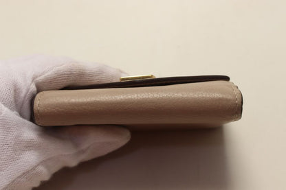 Louis Vuitton Leather Lock Mini Trifold Wallet — view 3