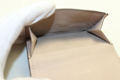 Louis Vuitton Leather Lock Mini Trifold Wallet — view 6