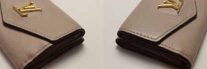 Louis Vuitton Leather Lock Mini Trifold Wallet — view 8