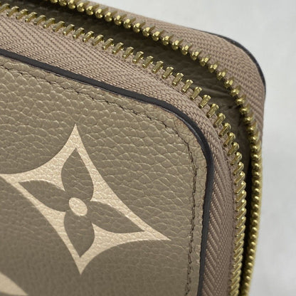 Louis Vuitton Wallet Monogram Empreinte Zippy Tourtelle Cream — view 6