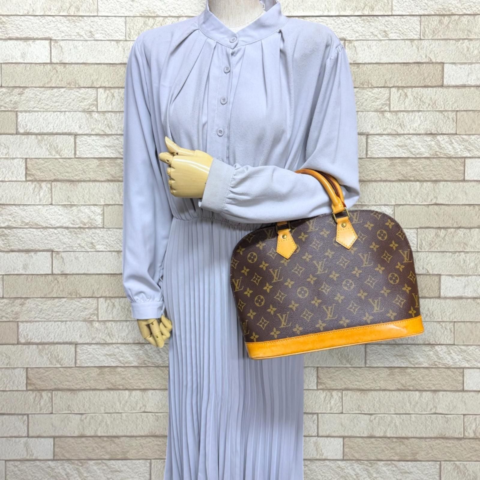 Louis Vuitton Alma Monogram Handbag Canvas Brown — view 2