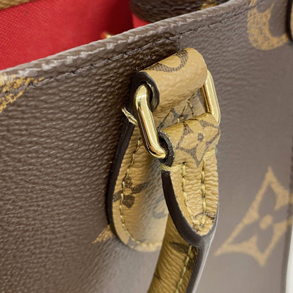 Louis Vuitton Handbag Monogram Giant Reverse On The Go PM Brown 2-Way — view 8