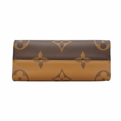 Louis Vuitton Handbag Monogram Giant Reverse On The Go PM Brown 2-Way — view 3