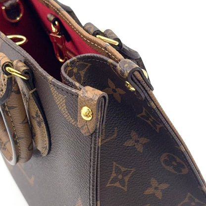 Louis Vuitton On The Go PM Monogram Reverse Correspondence Brown Handbag Gold — view 8