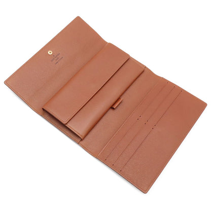 Louis Vuitton Monogram Porto Tresor International Wallet fold — view 5