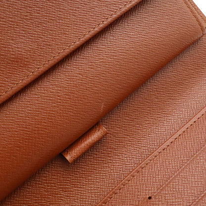 Louis Vuitton Monogram Porto Tresor International Wallet fold — view 7
