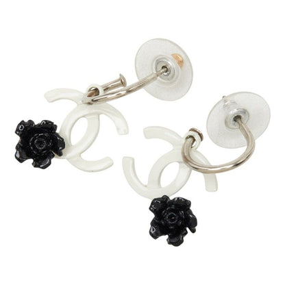 Chanel 04P CC Logo Camellia Swing Earrings 04 White Black Metal