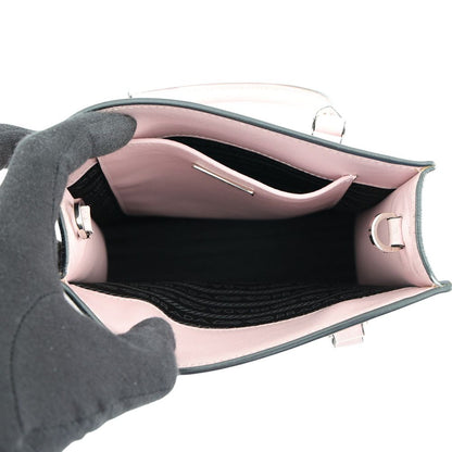 Prada Embossed Triangle Logo Mini Leather 2-Way Handbag — view 6
