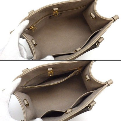 Louis Vuitton Tote Bag On The Go PM Tourtorail Cream Bicolor Monogram Empreinte — view 5
