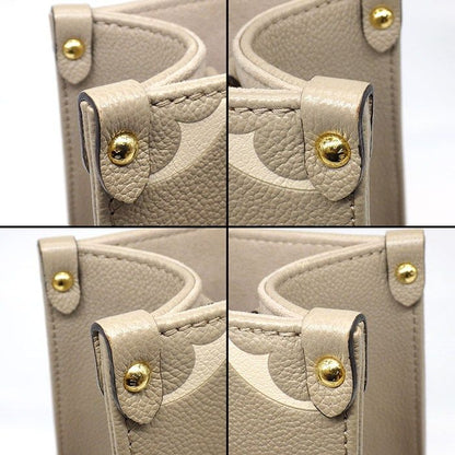 Louis Vuitton Tote Bag On The Go PM Tourtorail Cream Bicolor Monogram Empreinte — view 8