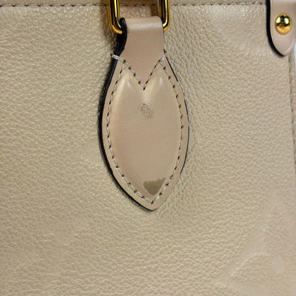 Louis Vuitton On The Go PM Handle 2-Way Monogram Empreinte Cream Tote Bag — view 4