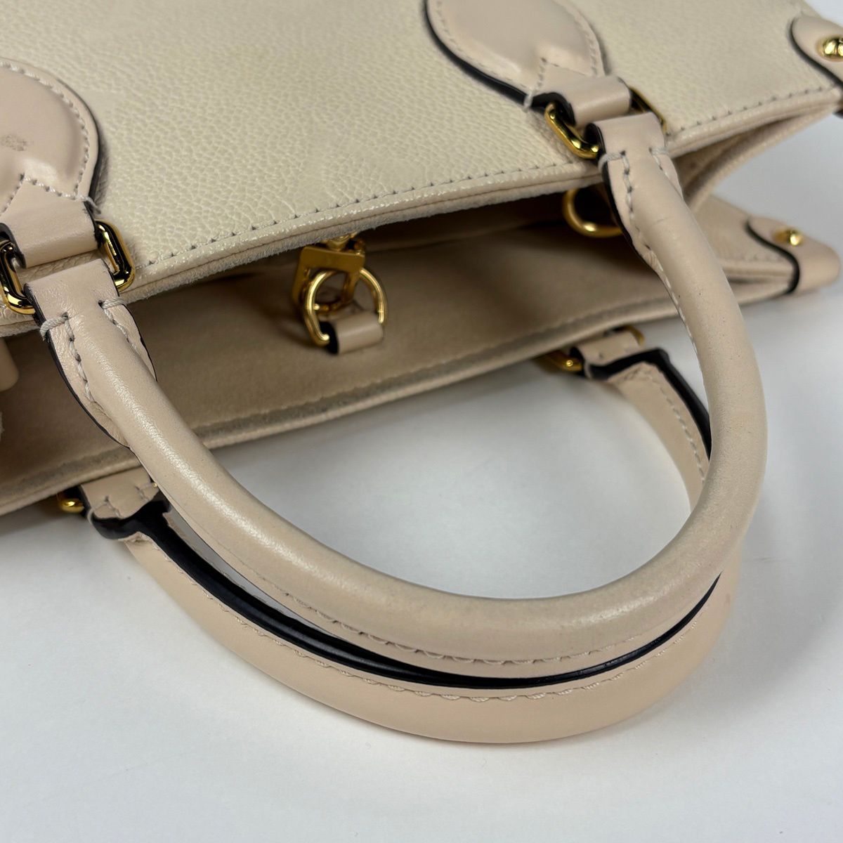 Louis Vuitton On The Go PM Handle 2-Way Monogram Empreinte Cream Tote Bag — view 5