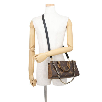 Louis Vuitton Handbag Monogram Reverse Giant On The Go East West Chain — view 6