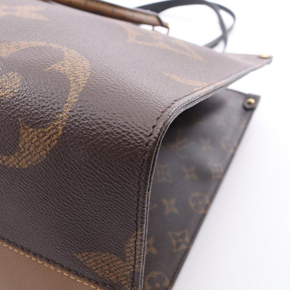 Louis Vuitton Shoulder Bag On The Go GM Monogram Giant Reverse Leather — view 5
