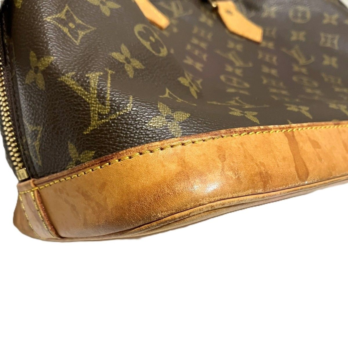 Louis Vuitton Alma PM Monogram Handbag Canvas — view 7