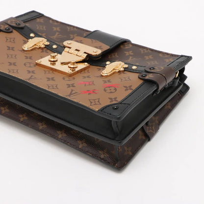 Louis Vuitton Monogram Reverse Trunk Clutch — view 3