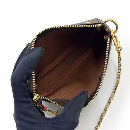Louis Vuitton Mini Pochette Soir Illustre Monogram Brown Handbag Gold — view 3