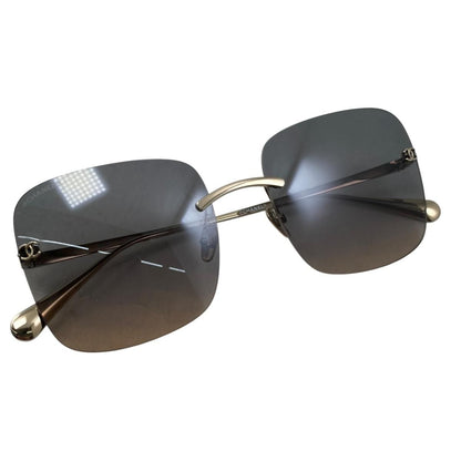 Chanel Sunglasses Rimless Square Titanium Gradient Lens Gold CC Logo Eyewear — view 5