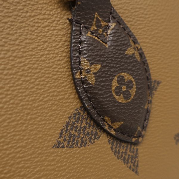 Louis Vuitton Tote On The Go MM Monogram Canvas Reverse Gold Handbag — view 5