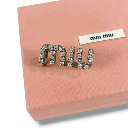 Miu Miu Crystal Logo Pierced Earrings Asymmetric Design Worn by Wonyoung