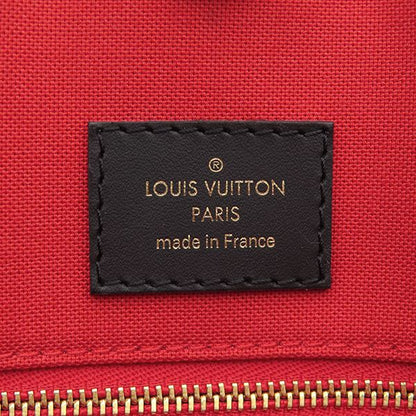 Louis Vuitton Tote Bag On The Go MM Monogram Canvas Reverse Gold — view 8