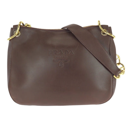 Prada Vintage Embossed Logo Brown Gold Leather Shoulder Bag