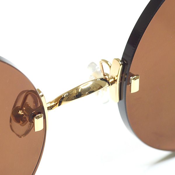 Cartier Decor C Sunglasses 002 Dark Brown Gold Havana Round Rimless Eyewear — view 4